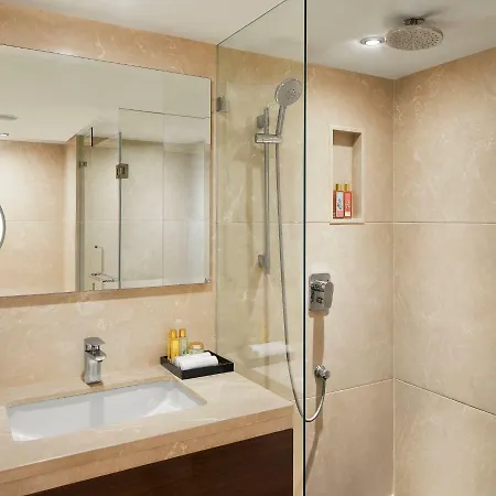 President - Ihcl Seleqtions Hotel Mumbai Exterior photo A shower with a sliding door